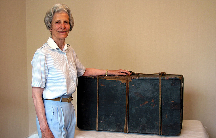 Ruth Klein standing next to Joanna Southcott’s Box of Prophecies.